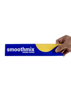 Person holding a roll of Smoothmix jumbo paper against a white background